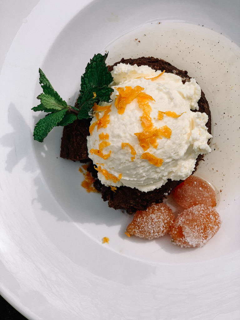 Chocolate Lava Cake with Orange Mascarpone Cream, Candied Kumquats and Cinnamon Vanilla Syrup